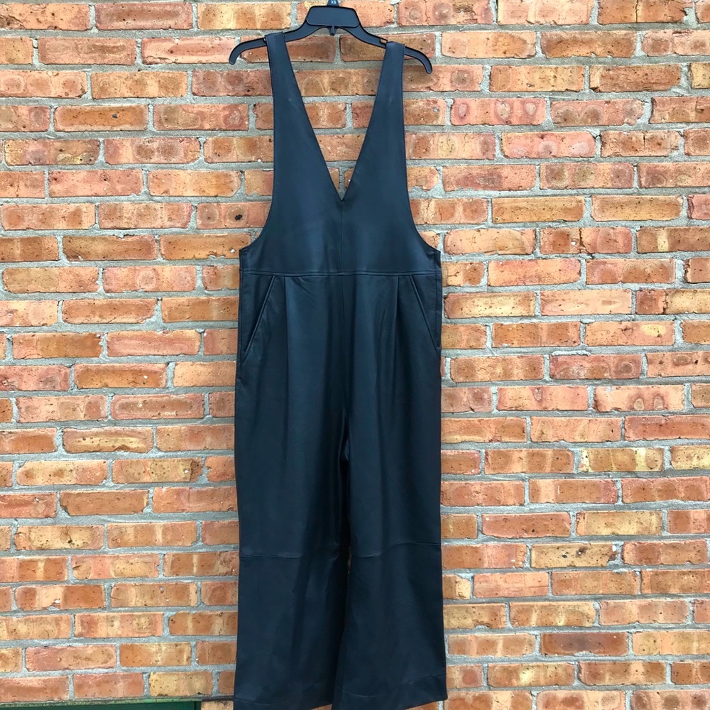 Free People black faux leather overalls size large